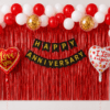 Happy Anniversary Red & White Balloon Decoration with Red Foil Curtain Red and white anniversary balloon decoration with red foil curtain backdrop, black gold Happy Anniversary banner, love you heart foil balloons and gold confetti balloons.
