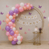 Pastel Pink Birthday Balloon Decoration Pastel pink and white birthday balloon decoration with Happy Birthday banner and balloon arch backdrop