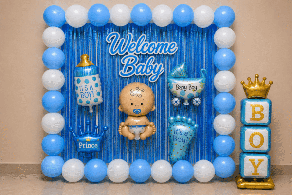 Welcome Baby Boy Decoration with Blue Balloon Setup Welcome baby boy decoration with blue and white balloons, blue foil curtain, baby foil balloons, boy stand and party backdrop.