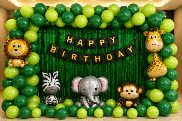 Jungle Theme Birthday Decoration with Animal Foil Balloons Jungle theme birthday decoration with green balloon arch, animal foil balloons, green foil curtain and happy birthday banner.